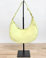 Aria Whipstich Crescent Bag in Pastel Yellow
