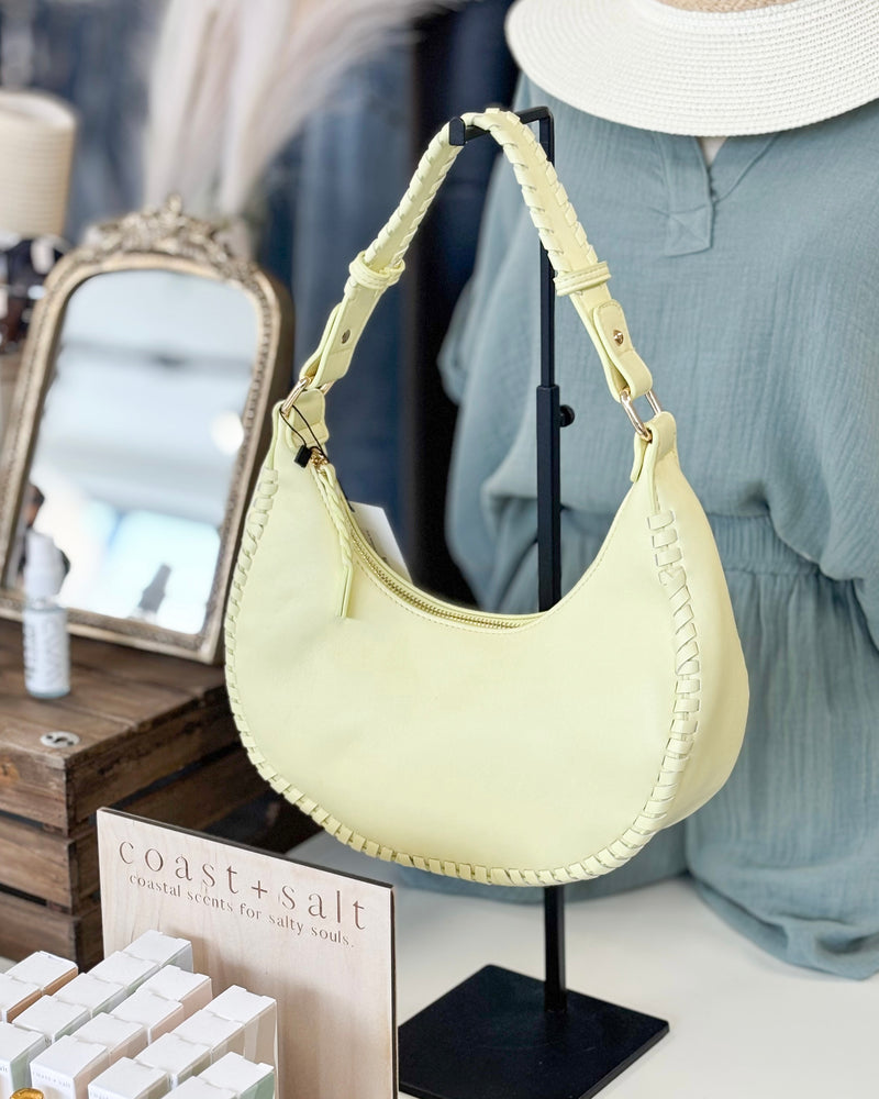 Aria Whipstich Crescent Bag in Pastel Yellow