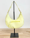 Aria Whipstich Crescent Bag in Pastel Yellow