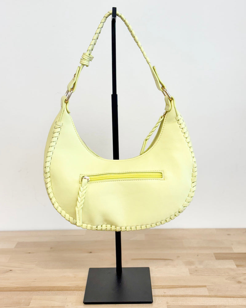 Aria Whipstich Crescent Bag in Pastel Yellow
