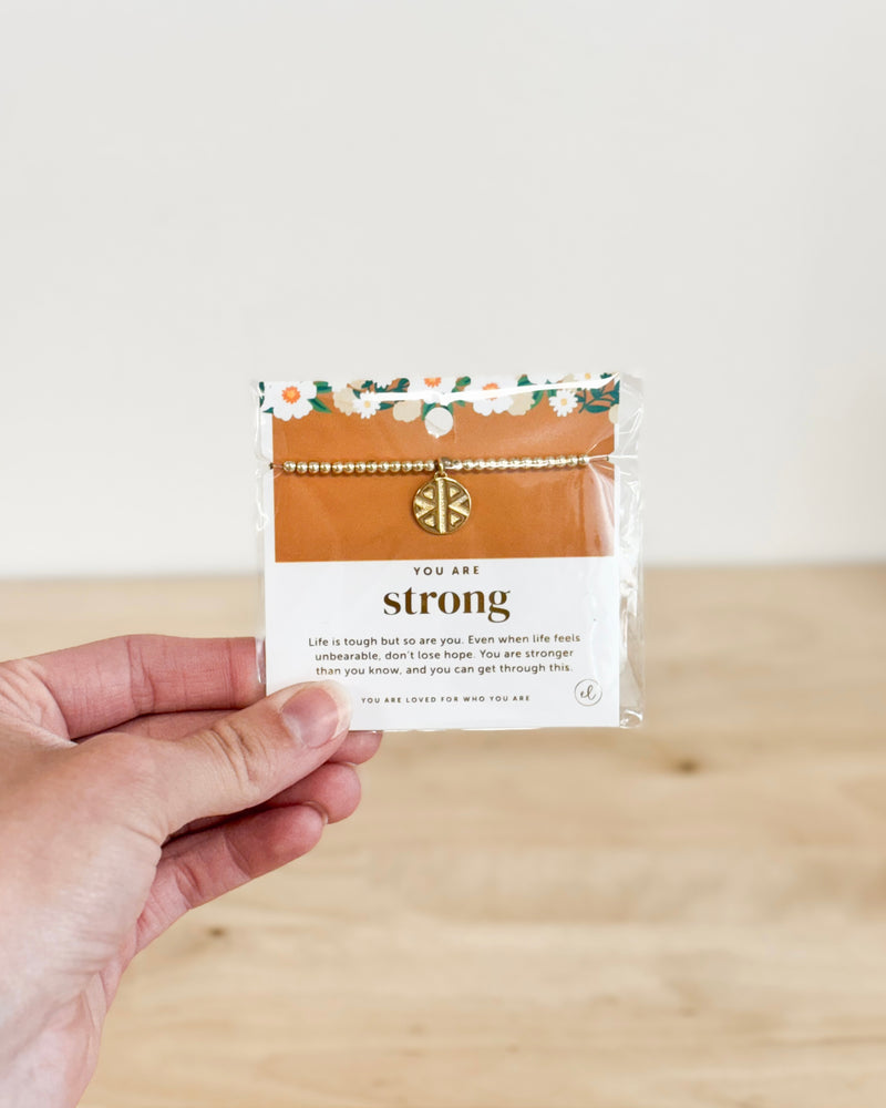 Trait Charm Bracelet: Strong