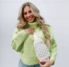The Penelope Quilted Sling Bag in Cream